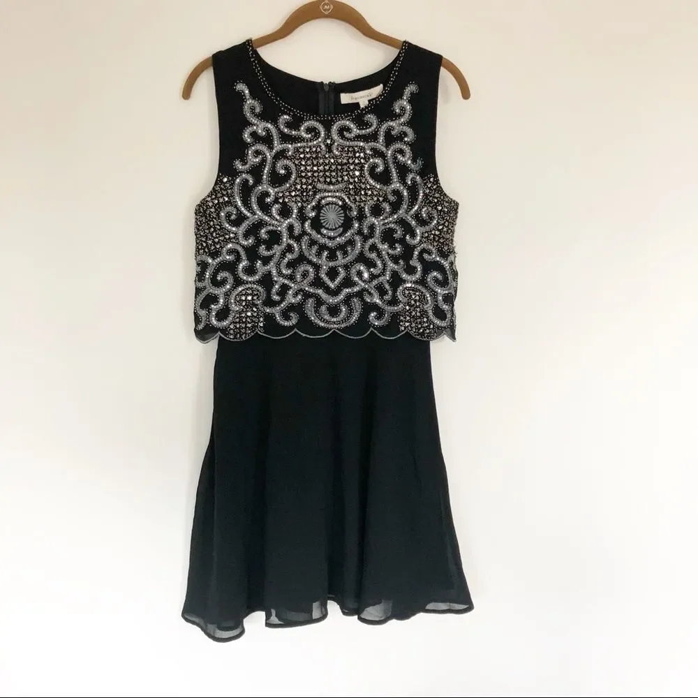 Francesca’s sequin pop-over dress Black Sz M
